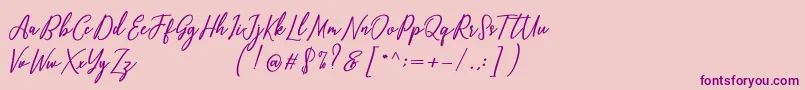 Capital Script Font – Purple Fonts on Pink Background