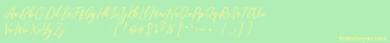 Capital Script Font – Yellow Fonts on Green Background