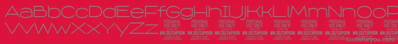 Шрифт CapoonLigh PERSONAL – серые шрифты на красном фоне