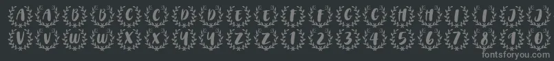 CAPS Font by 7NTypes-fontti – harmaat kirjasimet mustalla taustalla