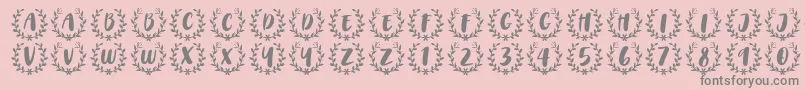 Fonte CAPS Font by 7NTypes – fontes cinzas em um fundo rosa