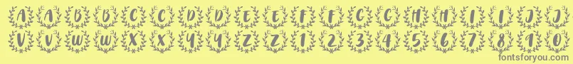 CAPS Font by 7NTypes Font – Gray Fonts on Yellow Background