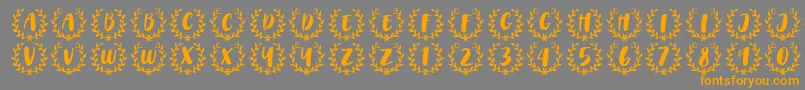 CAPS Font by 7NTypes-Schriftart – Orangefarbene Schriften auf grauem Hintergrund