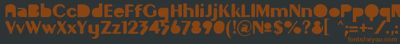 GilgongoMutombo-Schriftart – Braune Schriften auf schwarzem Hintergrund