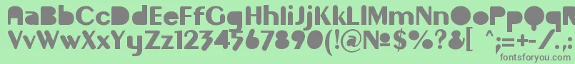 フォントGilgongoMutombo – 緑の背景に灰色の文字