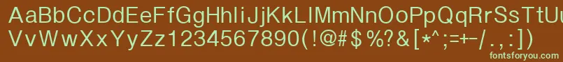 フォントSeutum – 緑色の文字が茶色の背景にあります。