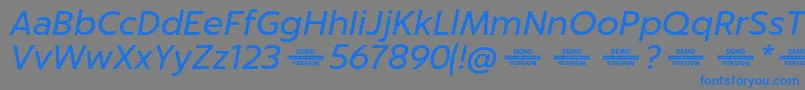 Captura ItalicDemo Font – Blue Fonts on Gray Background