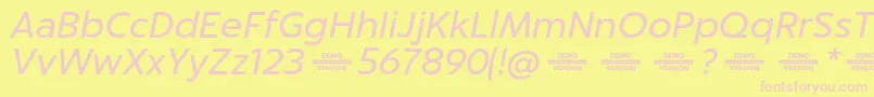 Captura ItalicDemo Font – Pink Fonts on Yellow Background