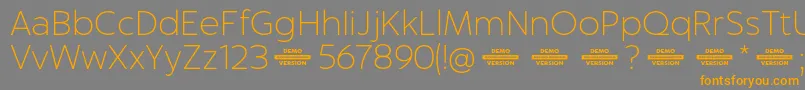 Captura ThinDemo Font – Orange Fonts on Gray Background