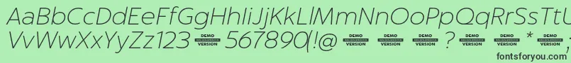 Czcionka Captura ThinItalicDemo – czarne czcionki na zielonym tle