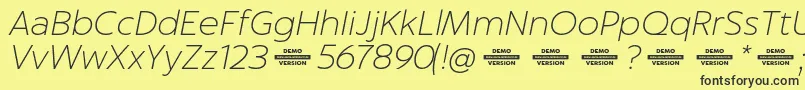 Captura ThinItalicDemo Font – Black Fonts on Yellow Background