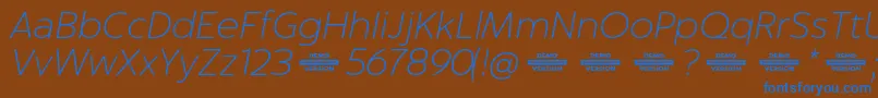 Captura ThinItalicDemo Font – Blue Fonts on Brown Background