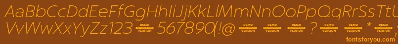 Captura ThinItalicDemo Font – Orange Fonts on Brown Background