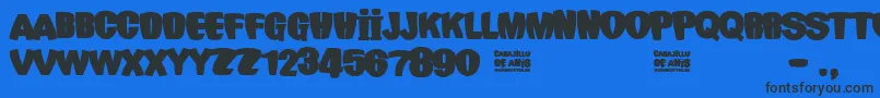 Carajillo de AnР±s Font – Black Fonts on Blue Background