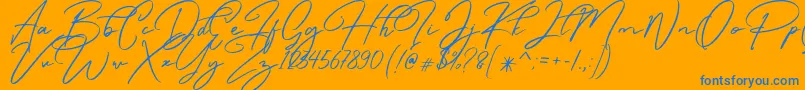 Caramello Free Font – Blue Fonts on Orange Background