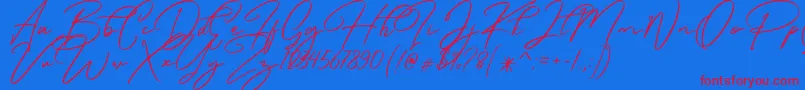 Caramello Free-Schriftart – Rote Schriften auf blauem Hintergrund