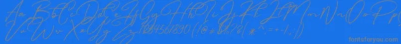 Caramello Free-Schriftart – Graue Schriften auf blauem Hintergrund