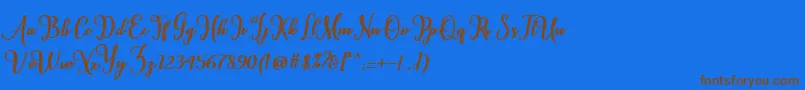 フォントCardina – 茶色の文字が青い背景にあります。