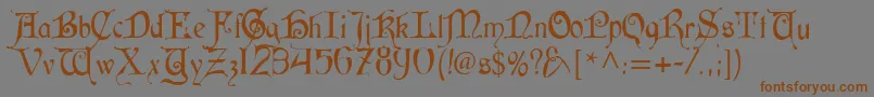 フォントCardinal Alternate – 茶色の文字が灰色の背景にあります。