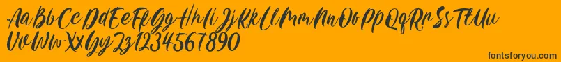 Carily DEMO VERSION-Schriftart – Schwarze Schriften auf orangefarbenem Hintergrund