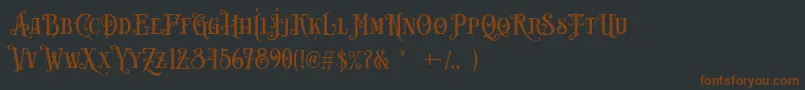 Шрифт Carllosta DEMO – коричневые шрифты на чёрном фоне