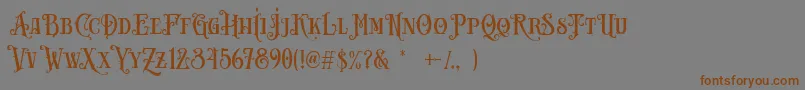 フォントCarllosta DEMO – 茶色の文字が灰色の背景にあります。