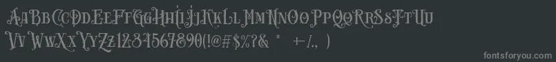 Carllosta DEMO-fontti – harmaat kirjasimet mustalla taustalla