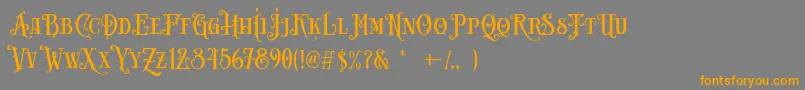Шрифт Carllosta DEMO – оранжевые шрифты на сером фоне