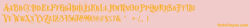 フォントCarllosta DEMO – オレンジの文字がピンクの背景にあります。