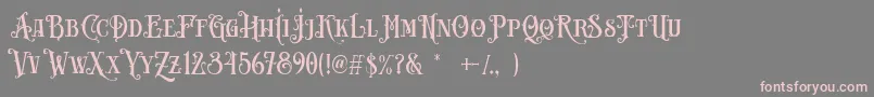 Carllosta DEMO-fontti – vaaleanpunaiset fontit harmaalla taustalla