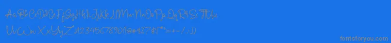 Carmillos-fontti – harmaat kirjasimet sinisellä taustalla