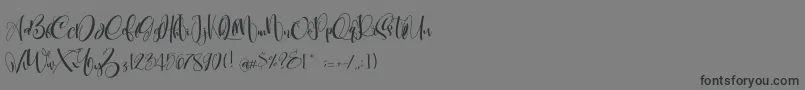 CarolynePersonalUse Font – Black Fonts on Gray Background