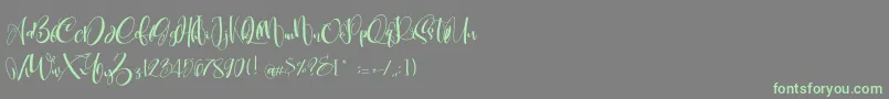 CarolynePersonalUse Font – Green Fonts on Gray Background