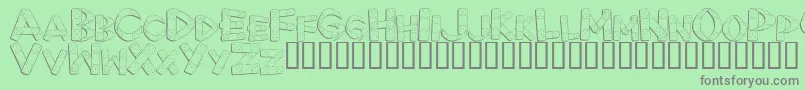 フォントFirst ffy – 緑の背景に灰色の文字