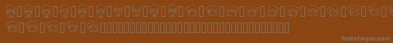 フォントCARTOONAMOL EXPRESSIONS – 茶色の背景に灰色の文字