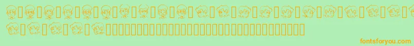 Czcionka CARTOONAMOL EXPRESSIONS – pomarańczowe czcionki na zielonym tle