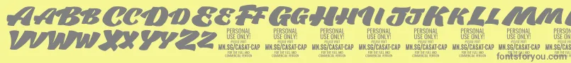 フォントCasatCapFat PERSONAL USE – 黄色の背景に灰色の文字