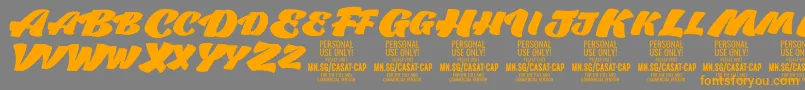 Шрифт CasatCapFat PERSONAL USE – оранжевые шрифты на сером фоне