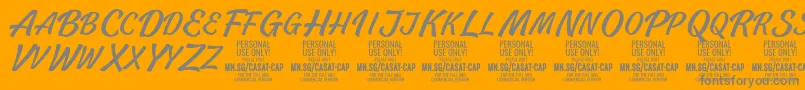 CasatCapLight PERSONAL USE-Schriftart – Graue Schriften auf orangefarbenem Hintergrund