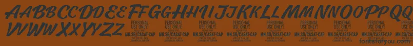 Шрифт CasatCapMed PERSONAL USE – чёрные шрифты на коричневом фоне