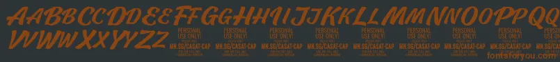 Шрифт CasatCapMed PERSONAL USE – коричневые шрифты на чёрном фоне