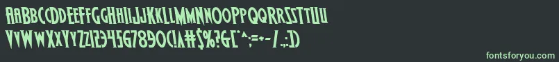 フォントWolfsbane2iisemileft – 黒い背景に緑の文字