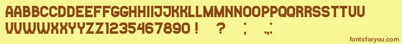 フォントCasinoFlat – 茶色の文字が黄色の背景にあります。