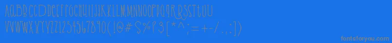 フォントCassandrabold demo – 青い背景に灰色の文字