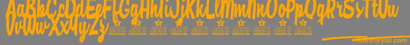 Casual Chance Personal Use-Schriftart – Orangefarbene Schriften auf grauem Hintergrund