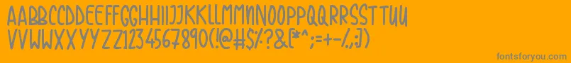 Casual Friday-fontti – harmaat kirjasimet oranssilla taustalla