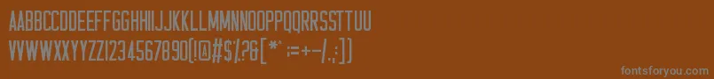Casual Hardcore-fontti – harmaat kirjasimet ruskealla taustalla