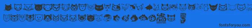 Cat Faces-Schriftart – Schwarze Schriften auf blauem Hintergrund