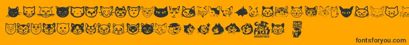 Fonte Cat Faces – fontes pretas em um fundo laranja