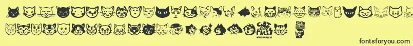 フォントCat Faces – 黒い文字の黄色い背景